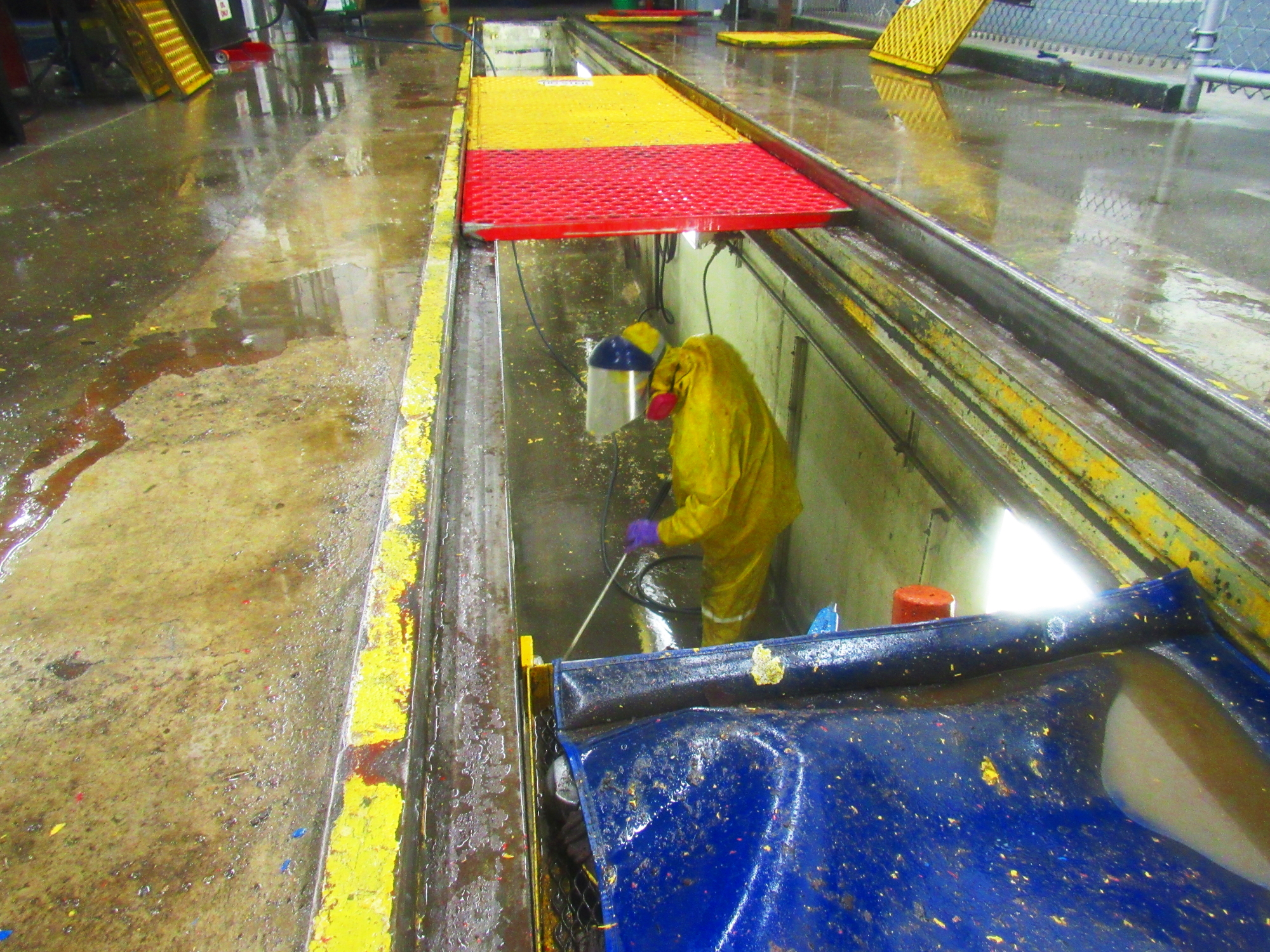 Expert in hazmat suit power washing factory for industrial chemical cleaning